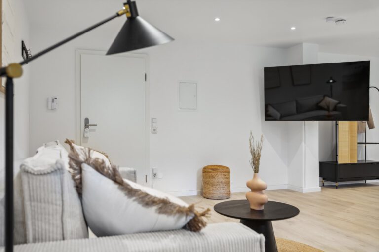 Im Wohnzimmer in der Casa Oasis II machst Du es Dir vor dem Smart-TV gemütlich.